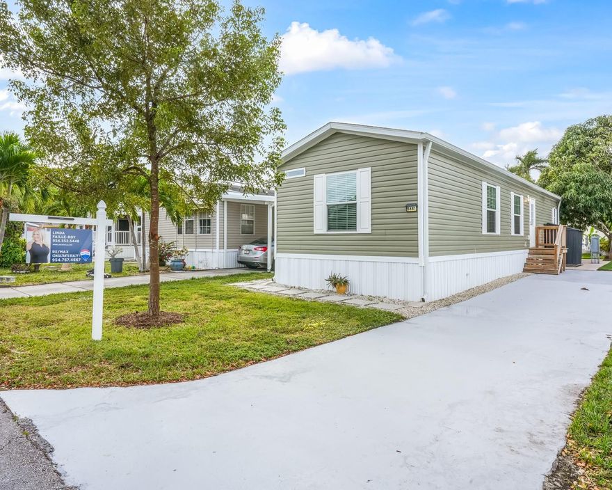 Come see modern, 2024 new built home home in the all-ages community of The Estates of Fort Lauderdale, where you own the land- and is able to be financed. Situated on one of the community’s biggest lots, this 2 bed, 2 bath offers open concept living, with everything inside the home from 2024—from the tiles on the roof down to the nails in the floorboard. and everything in-between! All stainless steel appliances, large farmhouse sink, spacious bedrooms, and baths, brand new cabinetry, and walk-in closets are a few key highlights to mention, but there's much more. Where freshly constructed meets contemporary design. Close to shopping, Hard Rock Casino & Hotel, and major highways. Come see this magnificent home today and make it yours!