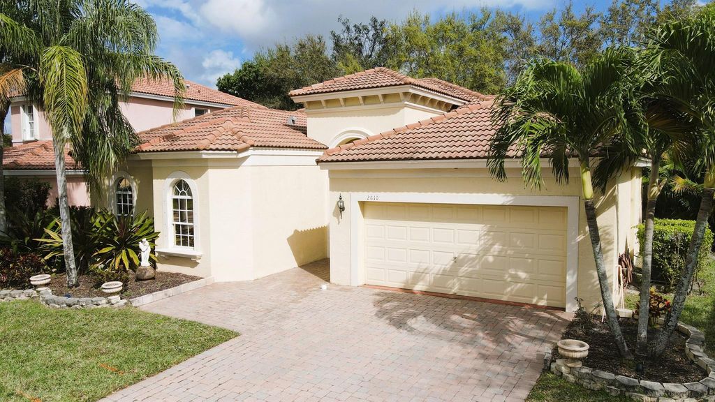 Photo of 2610 Sandy Cay, West Palm Beach, FL 33411 (MLS # R10965938)
