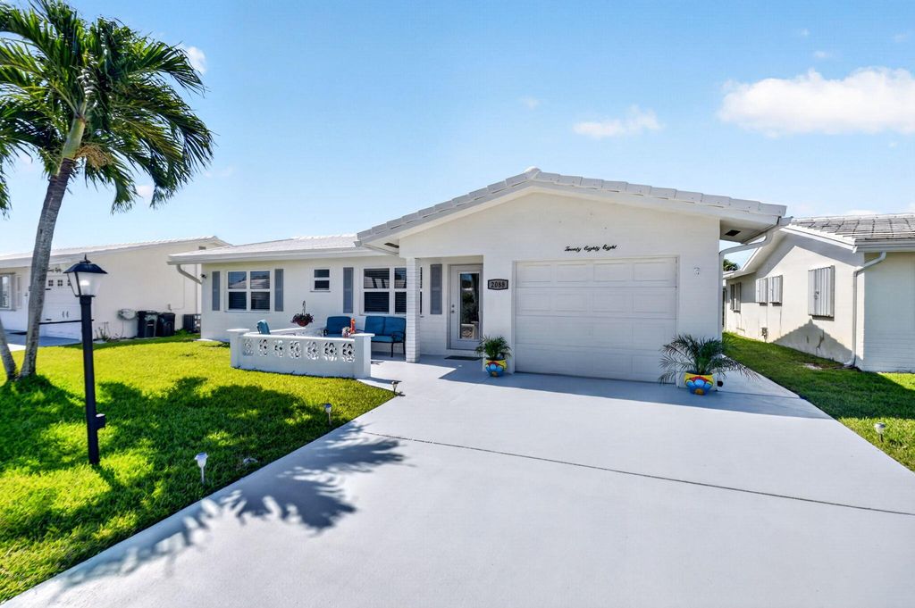 Photo of 2088 SW 13th Terrace, Boynton Beach, FL 33426 (MLS # B26021841)
