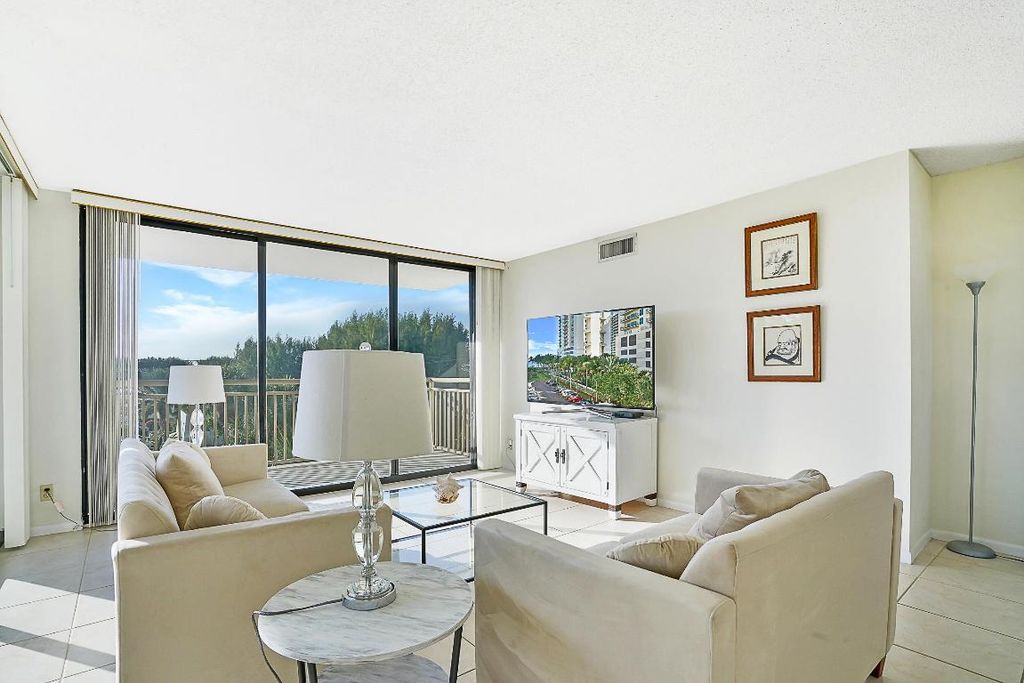 Photo of 3400 N Ocean Drive #408, Singer Island, FL 33404 (MLS # R11116718)