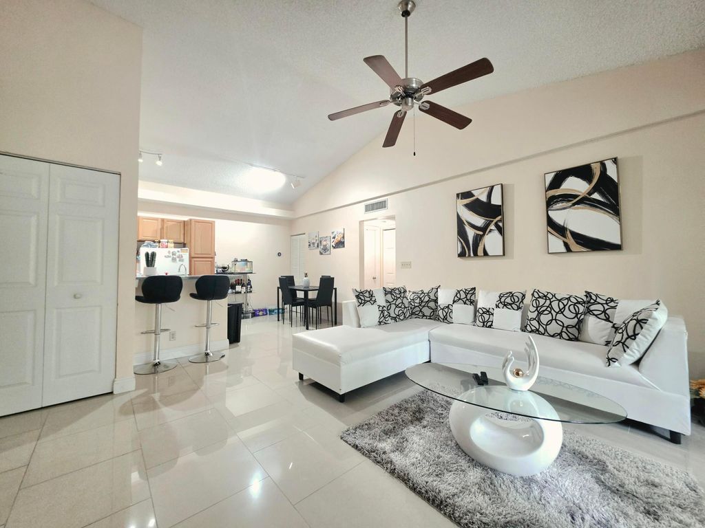 Photo of 641 Lyons Road #11203, Coconut Creek, FL 33063 (MLS # B26017703)