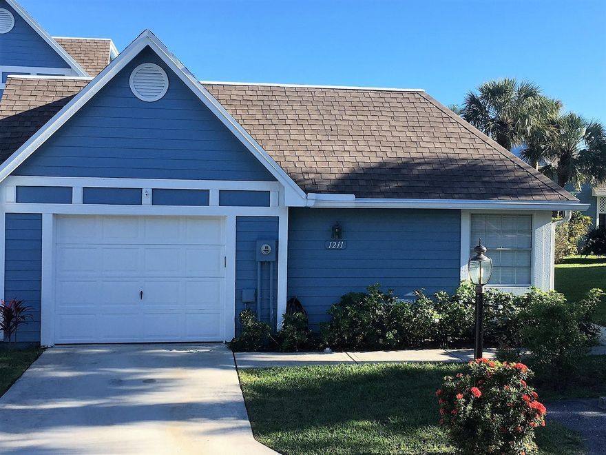 Lakefront 3 bedroom 2 bath villa with garage. This rare one-story end unit sits on the lake. Enjoy lake views, ocean breezes and privacy from this spectacular home. The villa features a screen porch and deck (both overlooking the lake)and has updated baths. Ocean Dunes is a gated community just over a block from the beach and a short walk to shopping and dining. Amenities include tennis, heated pool, and spa. All measurements are approximate. Information is deemed reliable, but is not guaranteed.