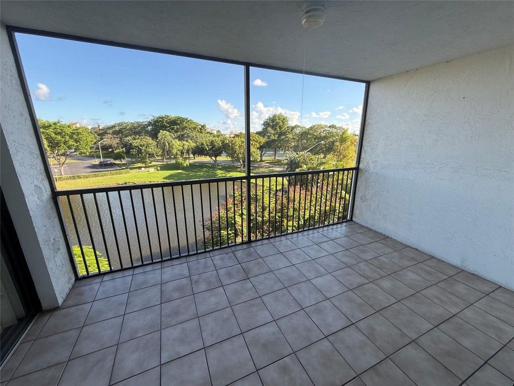 Photo of 2334 S Cypress Bend Drive #411, Pompano Beach, FL 33069 (MLS # F10532909)