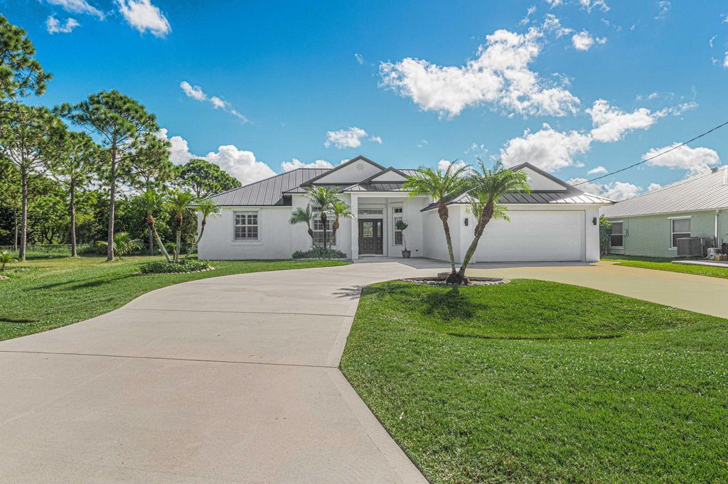 Photo of 6443 NW Hope Court, Port St Lucie, FL 34986 (MLS # R10922690)