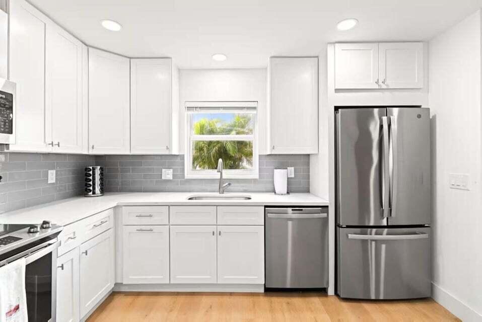 Photo of 1218 Surf Road, Singer Island, FL 33404 (MLS # B26081526)