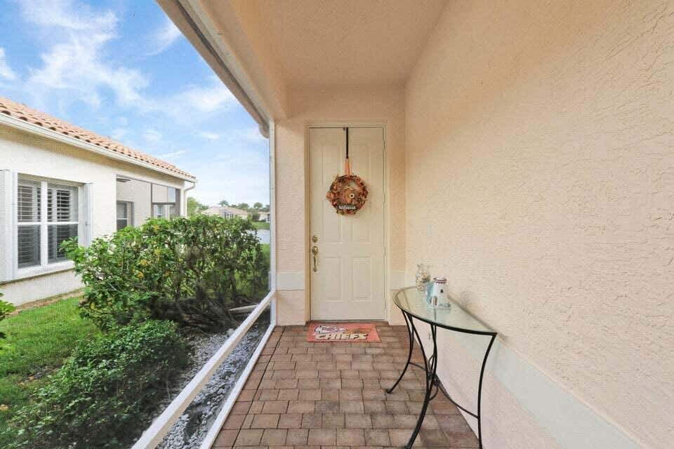 Photo of 319 NW Alana Avenue, Port Saint Lucie, FL 34986 (MLS # R10941895)