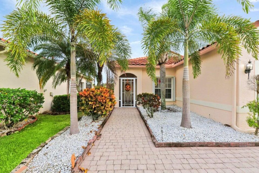 Photo of 319 NW Alana Avenue, Port Saint Lucie, FL 34986 (MLS # R10941895)