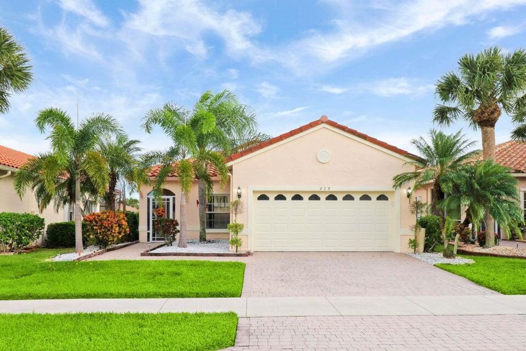 Photo of 319 NW Alana Avenue, Port Saint Lucie, FL 34986 (MLS # R10941895)