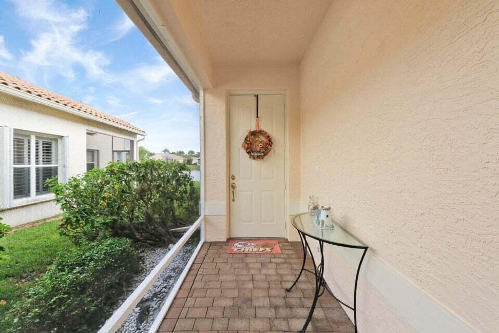 Photo of 319 NW Alana Avenue, Port Saint Lucie, FL 34986 (MLS # R10941895)