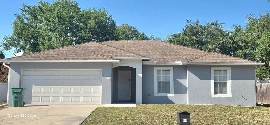 BEAUTIFUL 3 BEDROOM , 2 BATHROOM HOME, BRIGHT AND OPEN FLOOR PLAN WITH 2-CAR GARAGE IN THIS WELL MAINTAINED NEIGHBORHOOD ONLY MINUTES FROM THE TURNPIKE AND I95, BRAND NEW AC UNIT (2026), NEW REFRIGERATOR (2026), NEW DRYER (2026), TILE AND LAMINATE FLOORING THROUGHOUT (NO CARPET), HURRICANE SHUTTERS, SEAMLESS RAIN GUTTERS, SCREENED IN PORCH, PUBLIC WATER AND SEWER, HUGE YARD, WALKING DISTANCE TO WALMART, PUBLIX, MEDICAL FACILITIES, SCHOOLS AND PARKS. MASTER BEDROOM HAS SPACIOUS  WALK-IN CLOSET. HOME IS CONCRETE BLOCK BUILT, NO HOMEOWNERS ASSOC. SO RAPID APPROVAL AND MOVE-IN. LAWNCARE INCLUDED IN RENT.