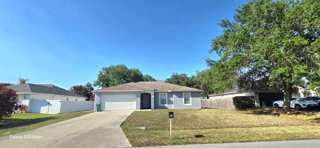 Photo of 1061 SW Charcoal Avenue, Port Saint Lucie, FL 34953 (MLS # B26014995)