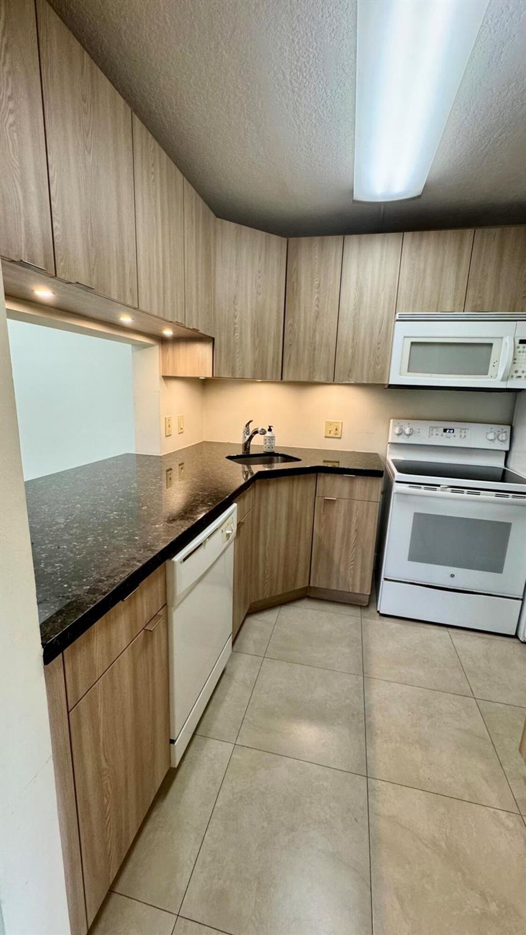 Photo of 719 Sunny Pine Way #B1, Greenacres, FL 33415 (MLS # R11128281)