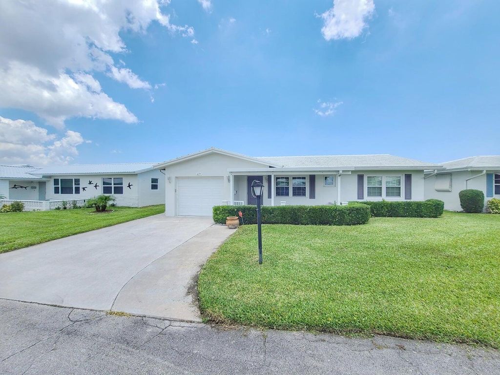 Photo of 629 SW 21st Circle, Boynton Beach, FL 33426 (MLS # R11072640)