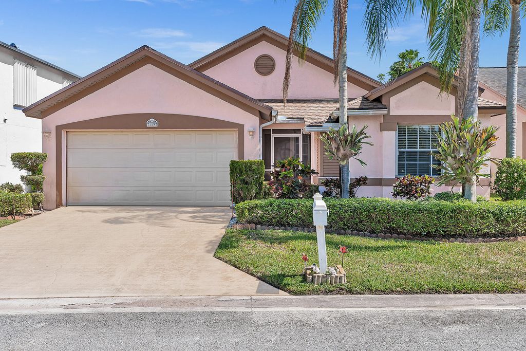 Photo of 119 Hammocks Court, Green Acres, FL 33413 (MLS # R10869855)