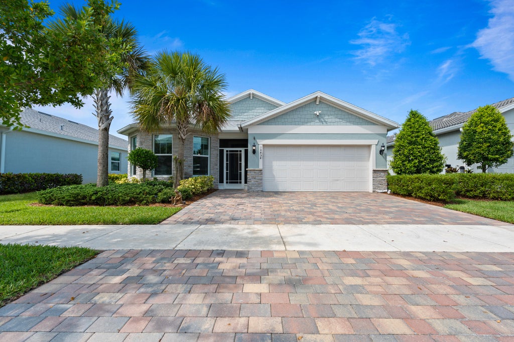 Photo of 10454 SW Captiva Drive, Port Saint Lucie, FL 34987 (MLS # B26066229)