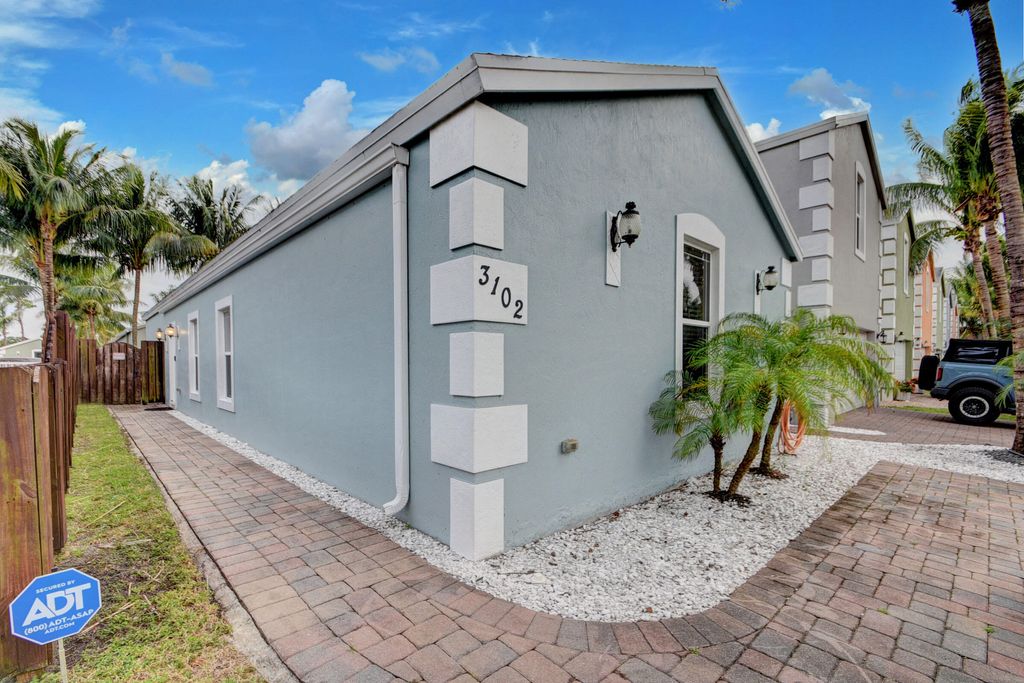 Photo of 3102 Shelby Way, Palm Springs, FL 33461 (MLS # R10949957)