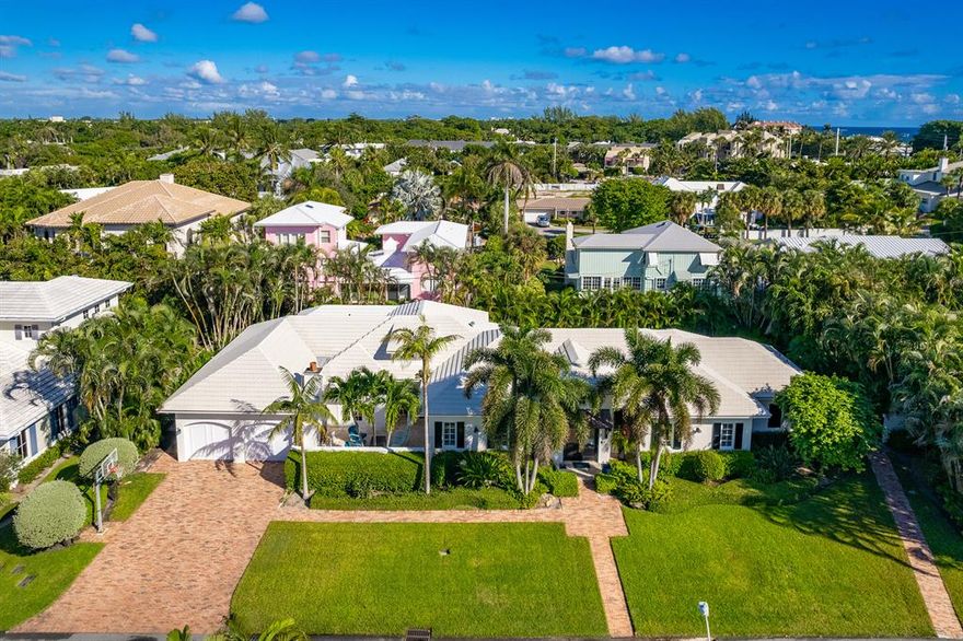 Stunning home on oversized lot. Private beach access! This gem was completely rebuilt in 2011, and updated this year including an all-new gourmet chef's kitchen and addition of guest suite with lush private patio. Surrounding the redesigned chef's kitchen, the living, dining and family areas boast an open layout with vaulted wood panel ceilings. A large master and 4 well situated guest suites provide ample space for family and friends. The home features truly unique outdoor space for entertaining or relaxing. The courtyard with wood burning fireplace is perfect for cozy winter nights. Over-looking the tropical grounds, heated pool and spa is an inviting loggia complete with summer kitchen, wet bar, and tv. Perfect for enjoying the South Florida lifestyle, this home is situated in a highly desirable area less than a mile from Atlantic Avenue and steps from the beach.