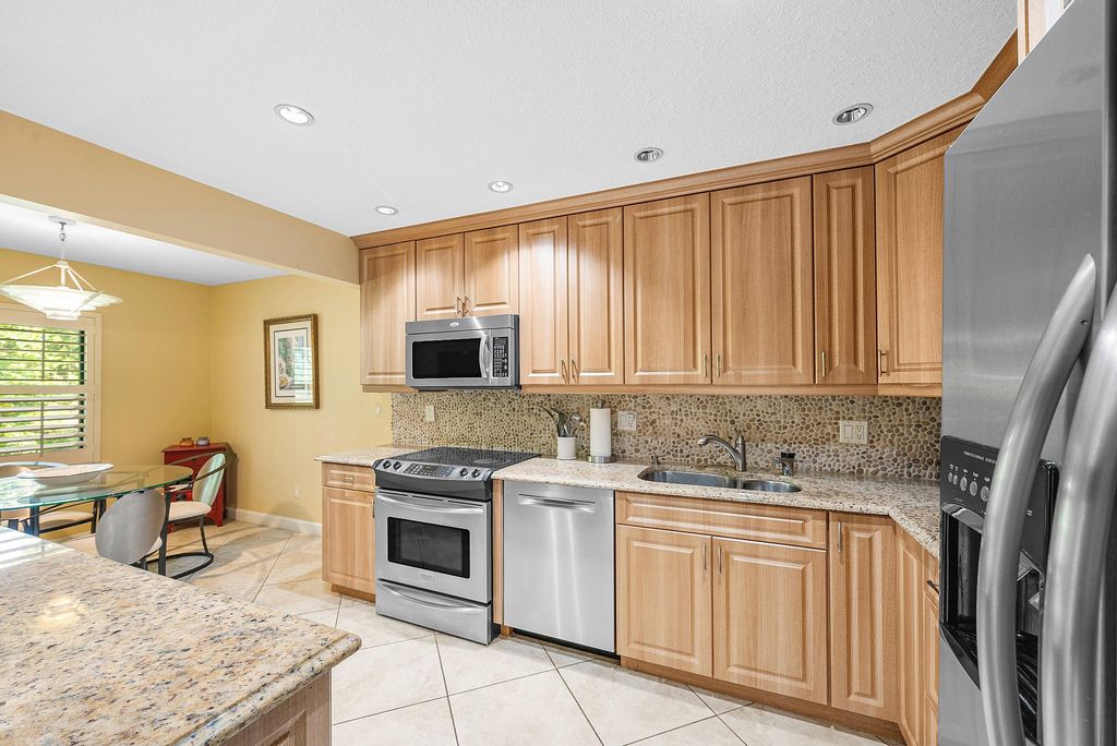 Photo of 22 Westgate Lane #Apt. E, Boynton Beach, FL 33436 (MLS # B26017185)