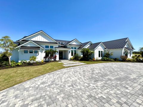 Photo of 7001 SW Pentalago Circle, Palm City, FL 34990 (MLS # B26007687)