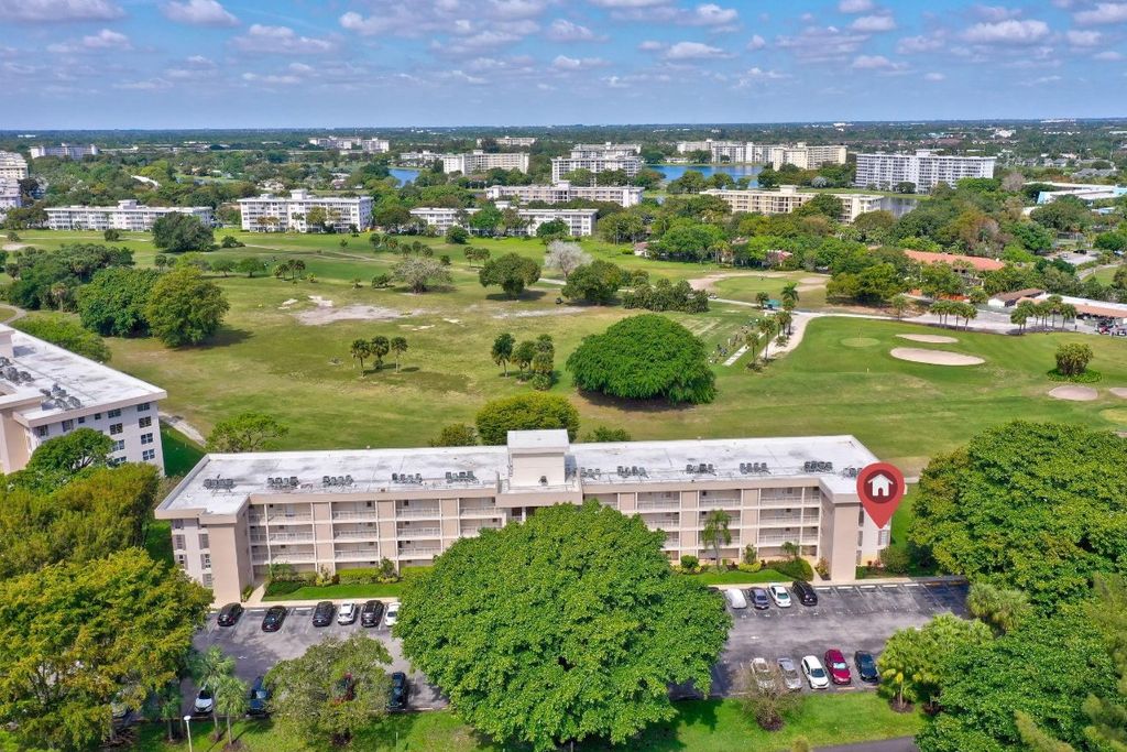 Photo of 2601 S Course Drive #201, Pompano Beach, FL 33069 (MLS # F10428095)