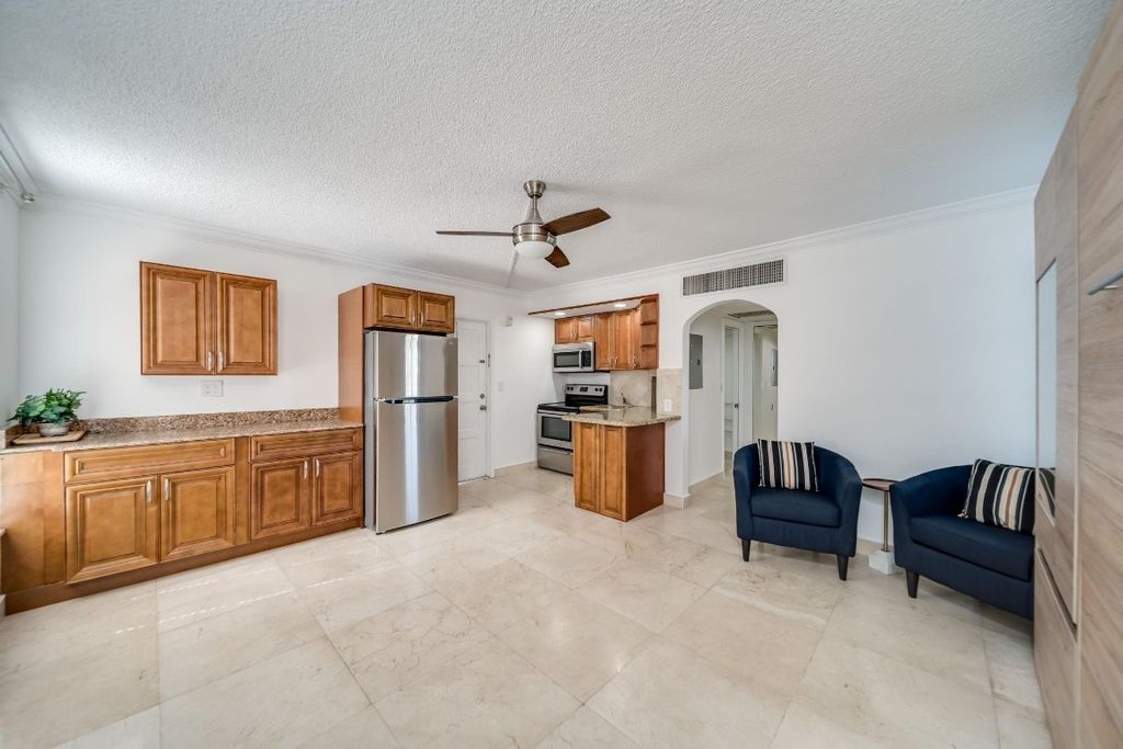 Photo of 2601 S Course Drive #201, Pompano Beach, FL 33069 (MLS # F10428095)