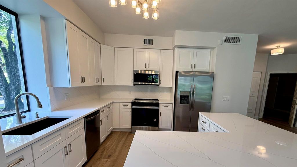 Photo of 5800 Coach House Circle #B, Boca Raton, FL 33486 (MLS # R11092954)