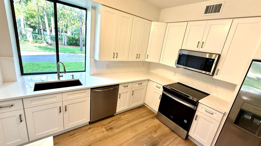 Photo of 5800 Coach House Circle #B, Boca Raton, FL 33486 (MLS # R11092954)