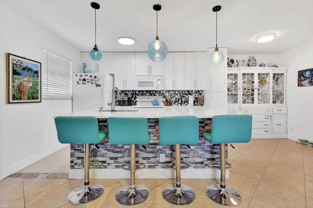 Photo of 1232 Club Drive W #D, Delray Beach, FL 33445 (MLS # B26009761)