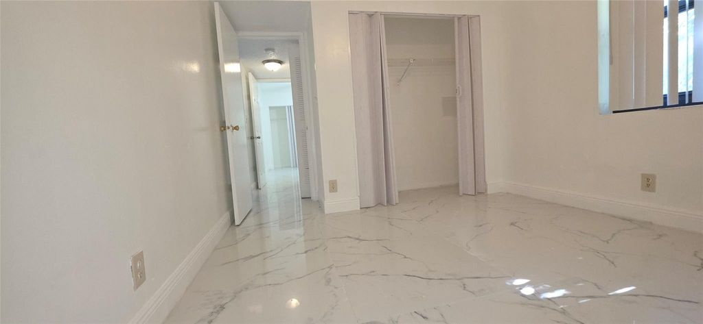Photo of 11158 W Sample Road #11158, Coral Springs, FL 33065 (MLS # F10542483)