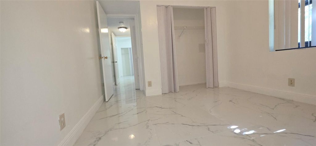 Photo of 11158 W Sample Rd #11158, Coral Springs, FL 33065 (MLS # F10542483)