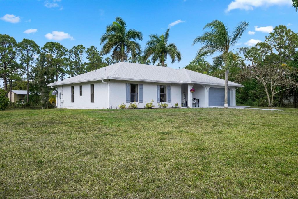 Photo of 17687 W 71st Lane N, The Acreage, FL 33470 (MLS # R11079739)