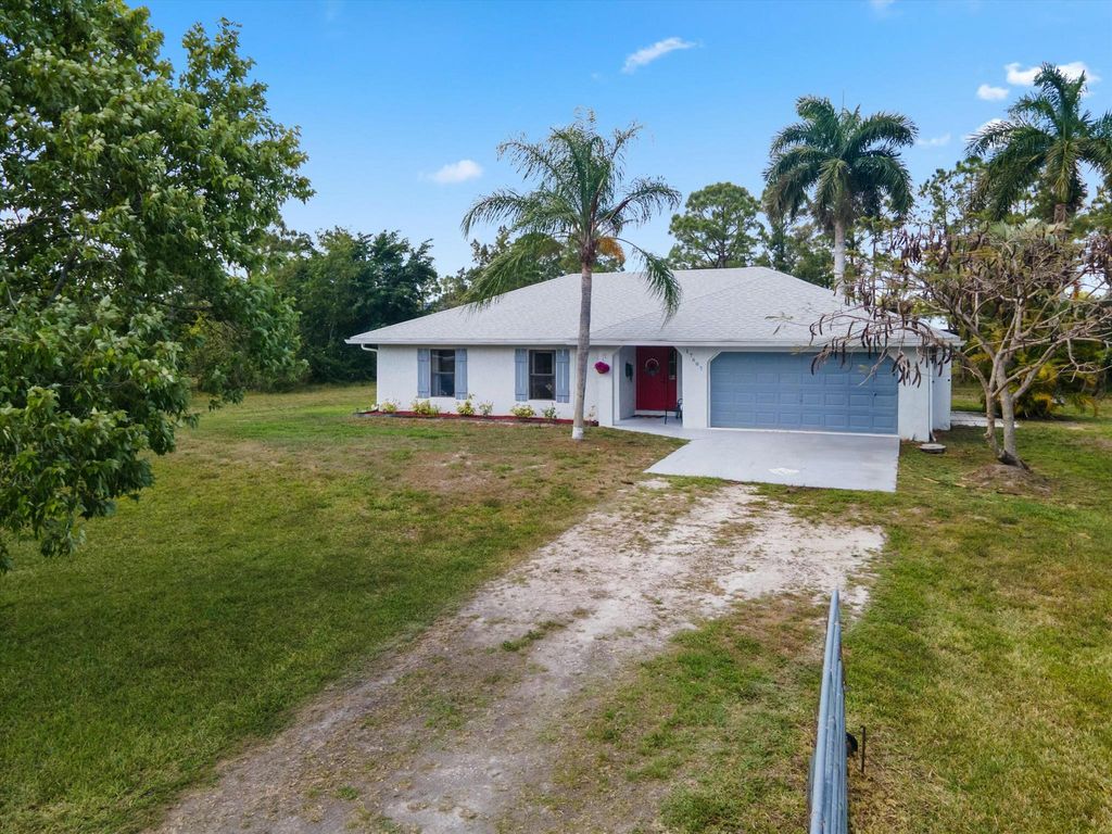 Photo of 17687 W 71st Lane N, The Acreage, FL 33470 (MLS # R11079739)