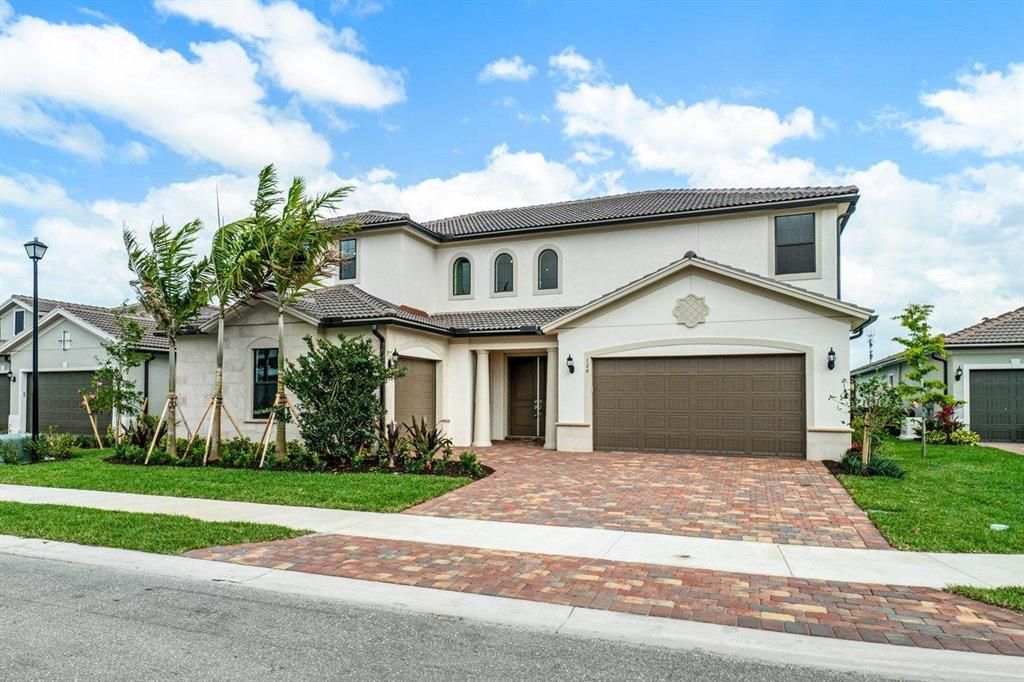 Photo of 126 Crimson Isles Drive, Jupiter, FL 33478 (MLS # R10698837)