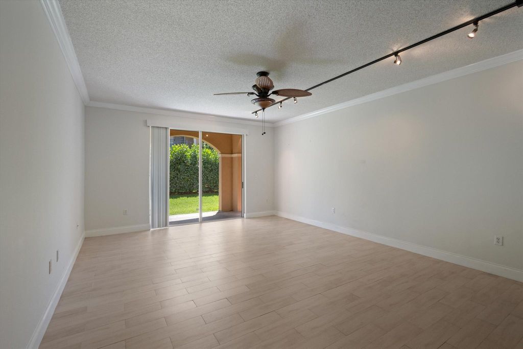 Photo of 11781 Saint Andrews Place #107, Wellington, FL 33414 (MLS # R11095746)