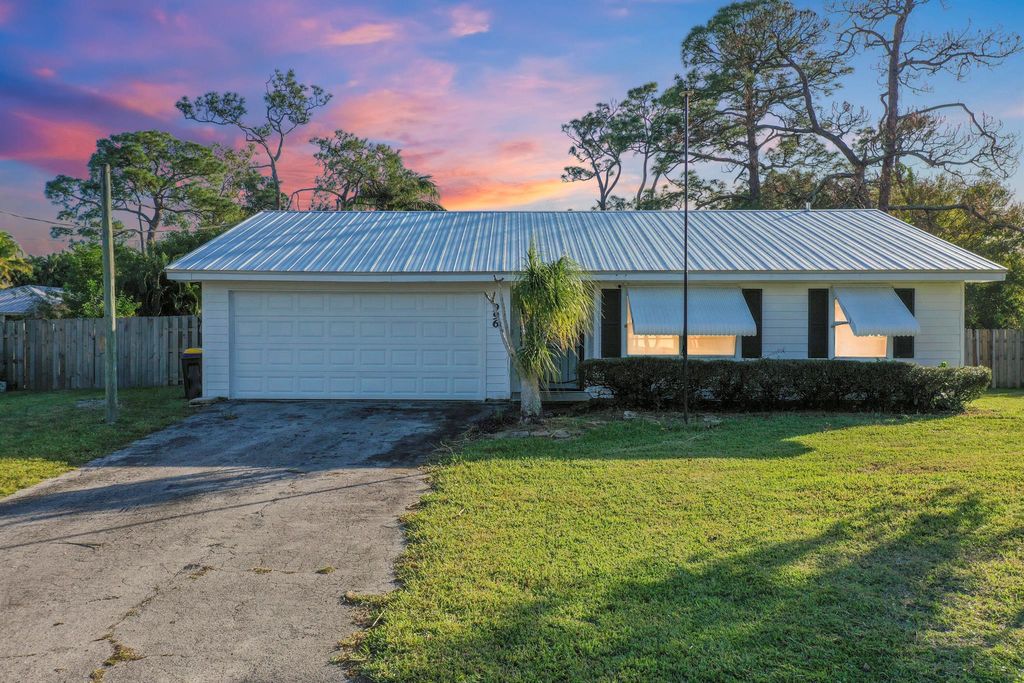 Photo of 996 SW 29th Terrace, Palm City, FL 34990 (MLS # R10945401)