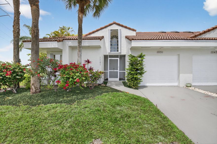 FABULOUS CORNER VILLA WITH GARAGE AT THE END OF A CUL-DE-SAC STREET!  NEIGHBORS ON 1 SIDE ONLY!  EXPANSIVE VIEWS FROM LIVING ROOM WINDOWS!  LARGEST MODEL. Light and bright open layout with split bedroom floor plan. Lots of natural light thru-out. Relax in your Florida Room with a wall of sliding glass doors overlooking a garden view. Enormous living room, plus family room or dining room, breakfast area, kitchen, & laundry room. The master bedroom suite offers a walk-in closet, 2nd closet, & master bath with dual sinks & walk-in shower. Vaulted ceilings. Accordion storm shutters. Gated 55+ community with clubhouse, pool, tennis courts, pickleball, fitness room, & walking paths. Lawn care included in LOW HOA fee. PETS: Emotional Support Animals and Service Animals welcome.  Active Boca Raton area with lots of shopping, dining, and recreation. Quick closing ok.  Exterior painting-2025. Water Heater-newer. Air Conditioner-2024. Roof- 2006. Accordion Shutters- 2007.