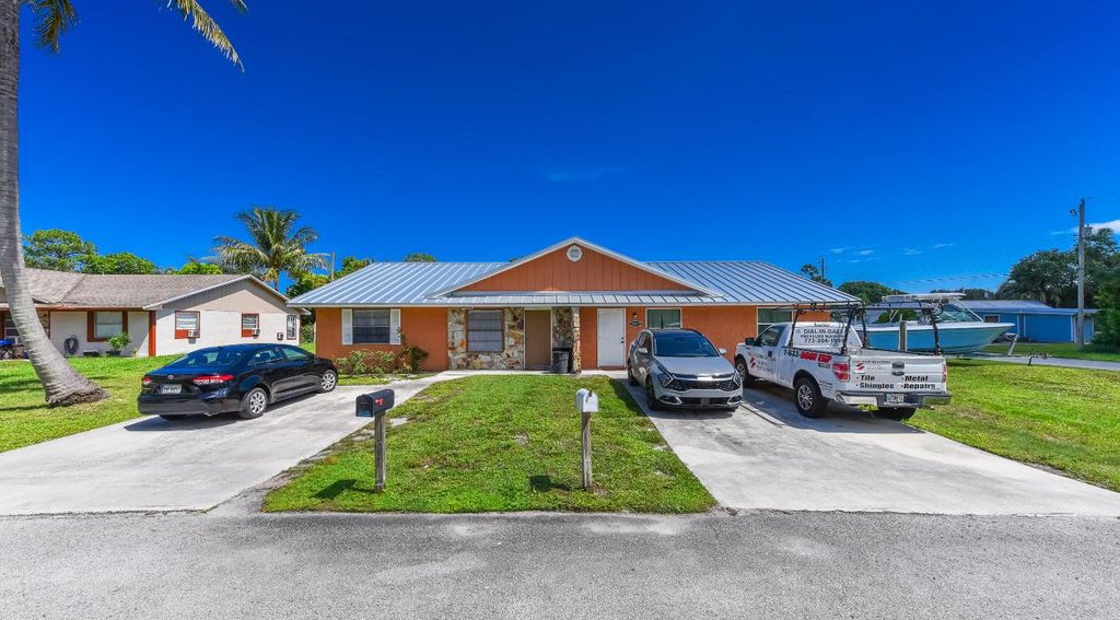 Photo of 5057 SE Driftwood Avenue, Stuart, FL 34997 (MLS # R11026667)