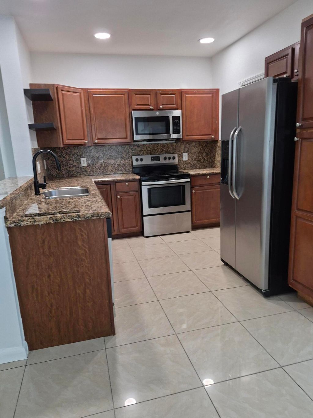 Photo of 5920 S Golden Beauty Lane, Tamarac, FL 33321 (MLS # B26027459)