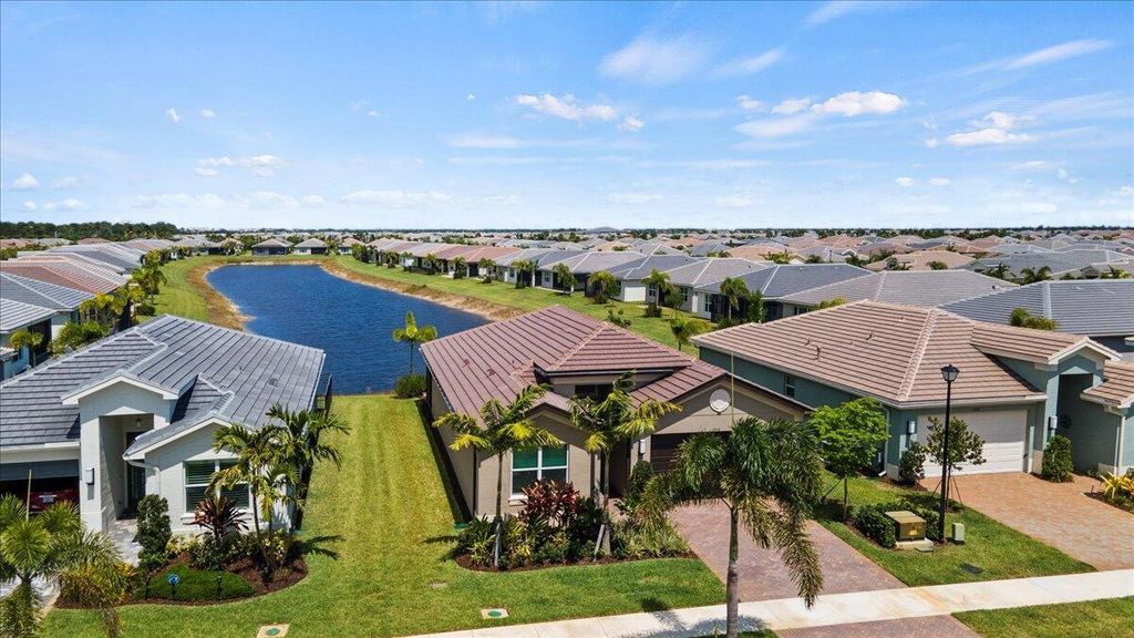 Photo of 13710 SW Oceanus Boulevard, Port Saint Lucie, FL 34987 (MLS # R10993517)