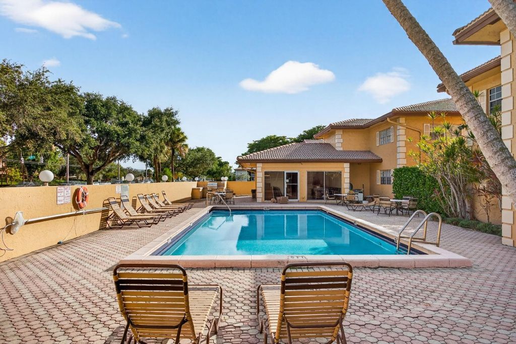Photo of 3034 Coral Springs Drive #202, Coral Springs, FL 33065 (MLS # F10514000)