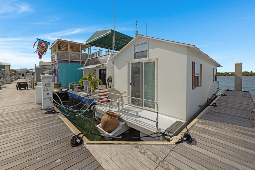 LIVE IN PARADISE AFFORDABLE LIVEABOARD Houseboat & Slip (Package) at Garrison Bight Marina (Houseboat Row). It's a Leasehold to the City of Key West and with the Transfer of Title to your name. NO RENTALS, VRBO/AIRBNB! This community is Historic. It's a TRUE KEY WEST LIFESTYLE... POF CASH ONLY! If your ready to enjoy life and have a crash pad in the Florida Keys, then come and see this one. Absolutely adorable. This community has no public pool. City charges 4% or 5% transfer fee for the Lease transfer, plus 1st, last & Security. Closings are with Closing Agent Oropeza, Stones & Cardenas