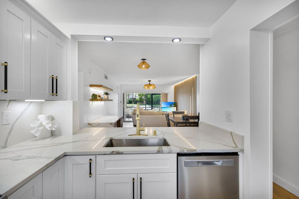 Photo of 12911 Briarlake Drive #103, Palm Beach Gardens, FL 33418 (MLS # R11165788)