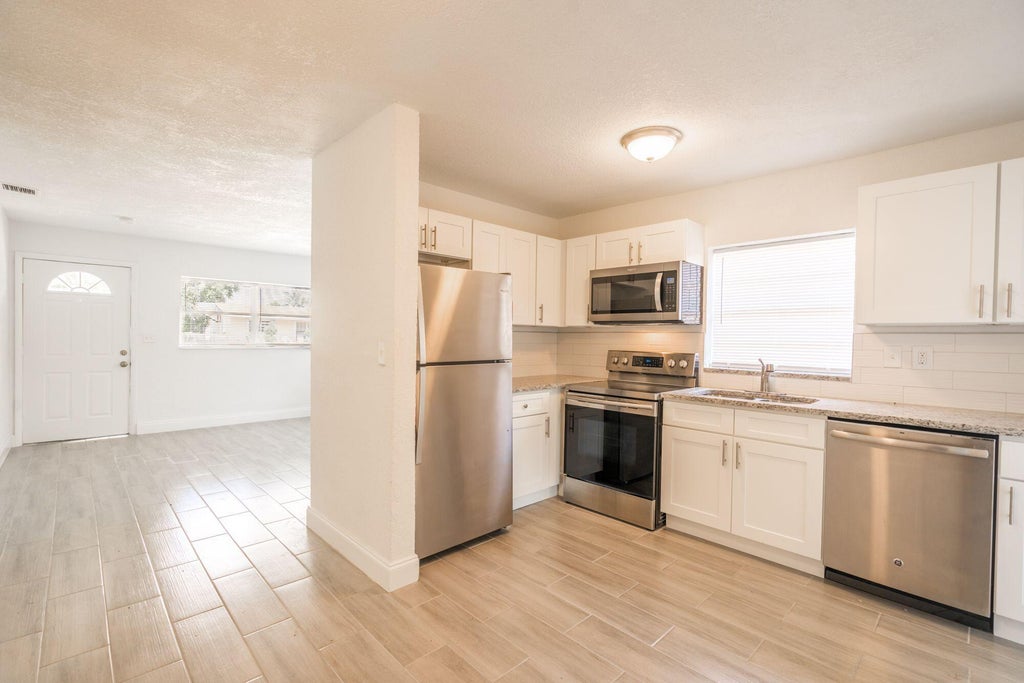 Photo of 700 NW 2nd Way, Deerfield Beach, FL 33441 (MLS # R11136499)