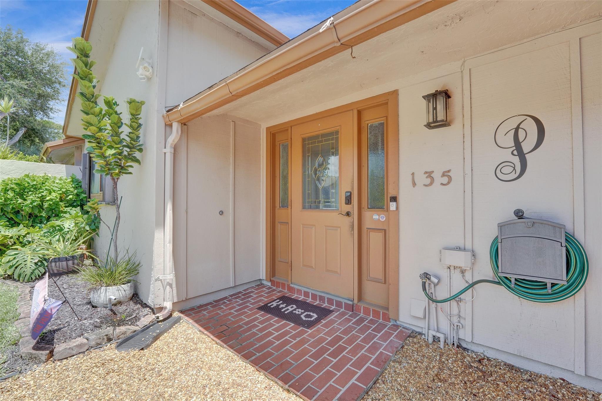 Welcome Home! This beautifully updated, move-in-ready villa offers the perfect blend of comfort, style, and privacy. Inside, you'll find a spacious open layout with luxury vinyl plank flooring throughout, motorized shades in key rooms, and a fully renovated primary bath. The enclosed, air-conditioned patio adds valuable year-round living space, while the expansive, fully fenced backyard—exclusive to this unit—provides rare privacy with no rear neighbors, ideal for entertaining, pets, or simply unwinding outdoors. Recent updates include AC in 2019, electrical panel replaced in 2020, accordion hurricane shutters, and new washer/dryer. Tucked away in a quiet, well-maintained community, have peace of mind and effortless living. A rare opportunity you won’t want to miss!