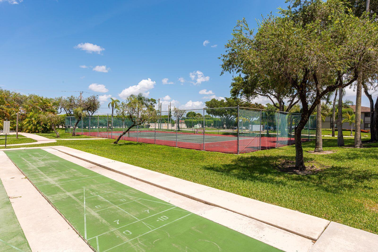 TAMARAC GARDENS CONDOMINI - Residential Lease