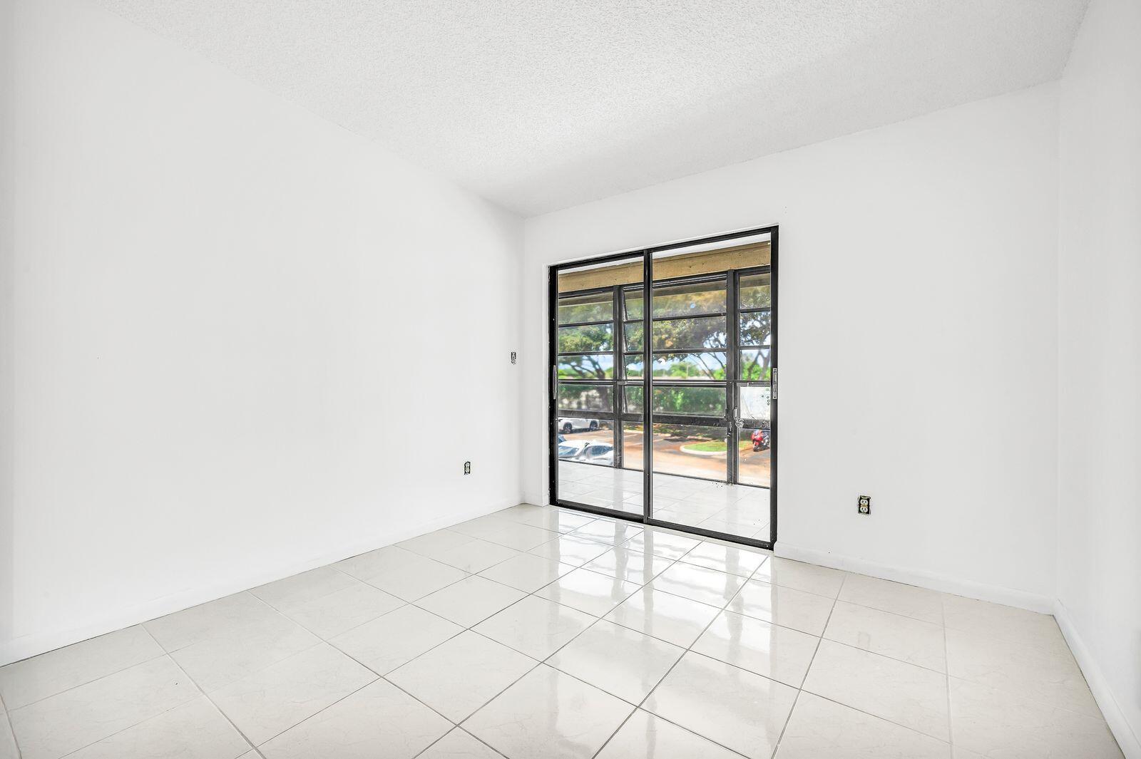 TAMARAC GARDENS CONDOMINI - Residential Lease