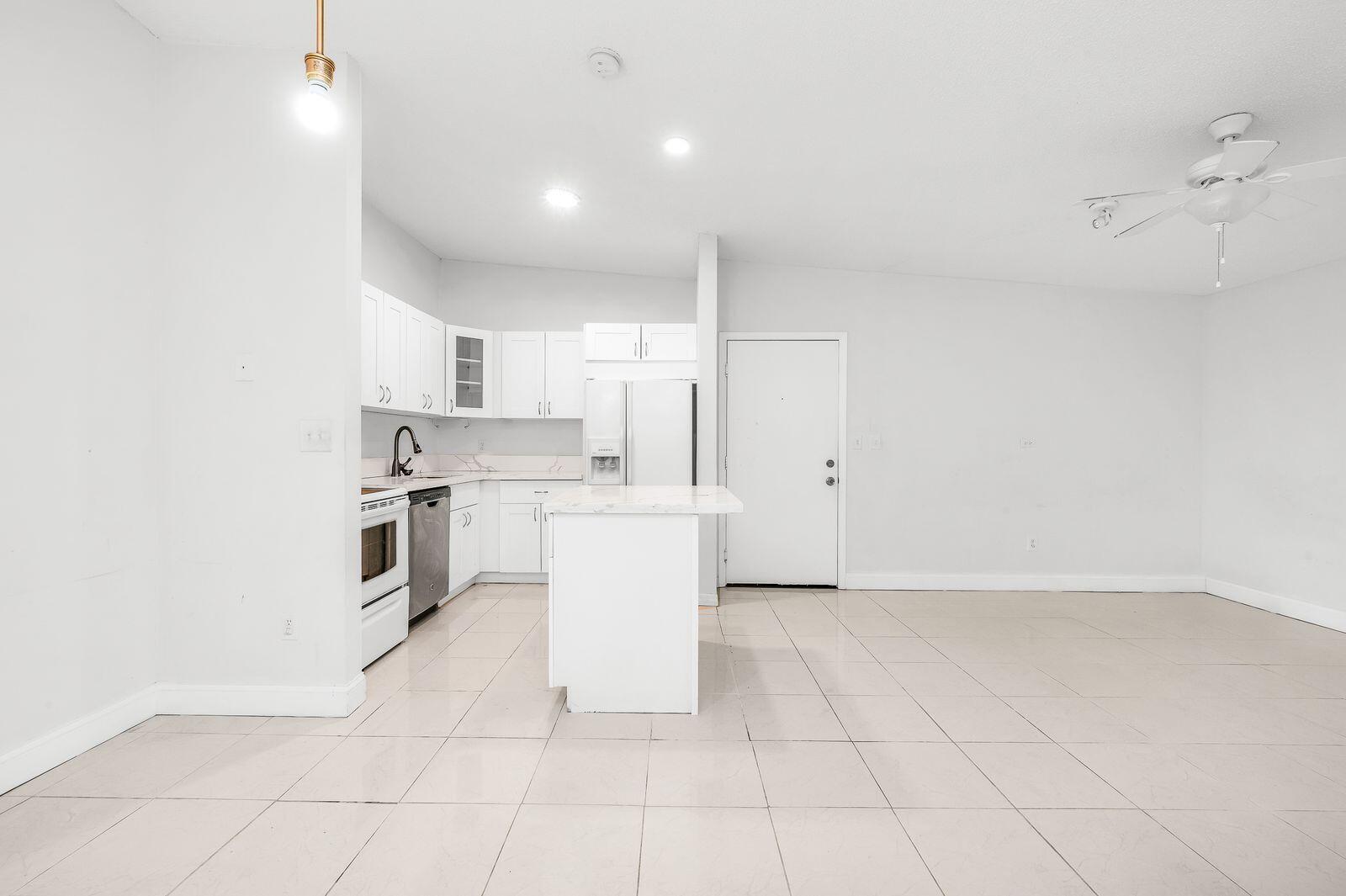 TAMARAC GARDENS CONDOMINI - Residential Lease