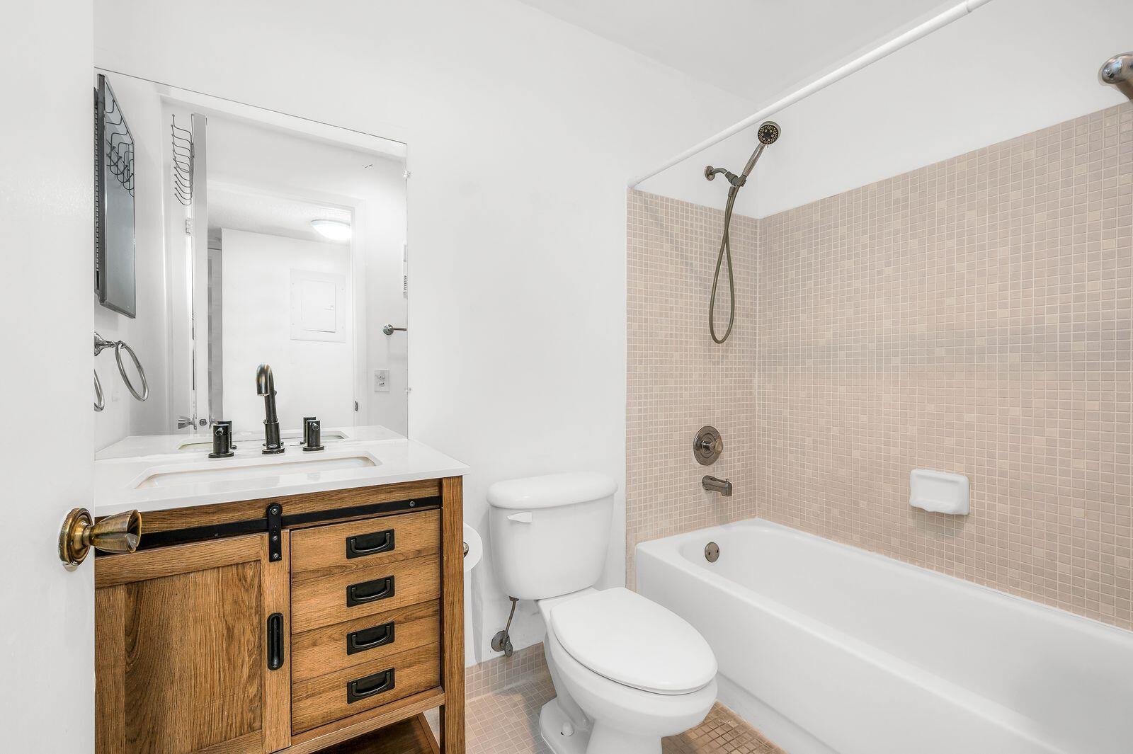 TAMARAC GARDENS CONDOMINI - Residential Lease