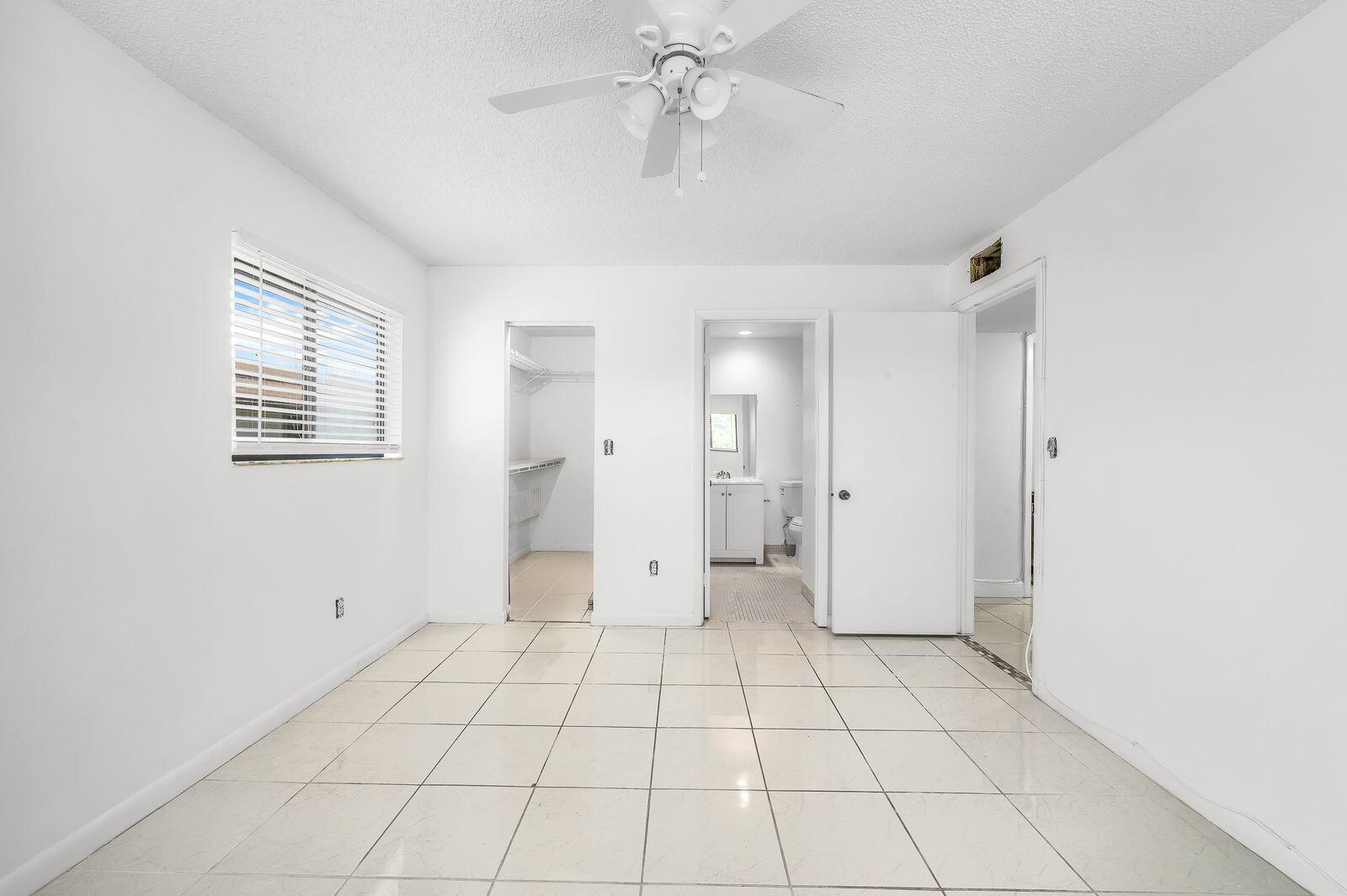 TAMARAC GARDENS CONDOMINI - Residential Lease