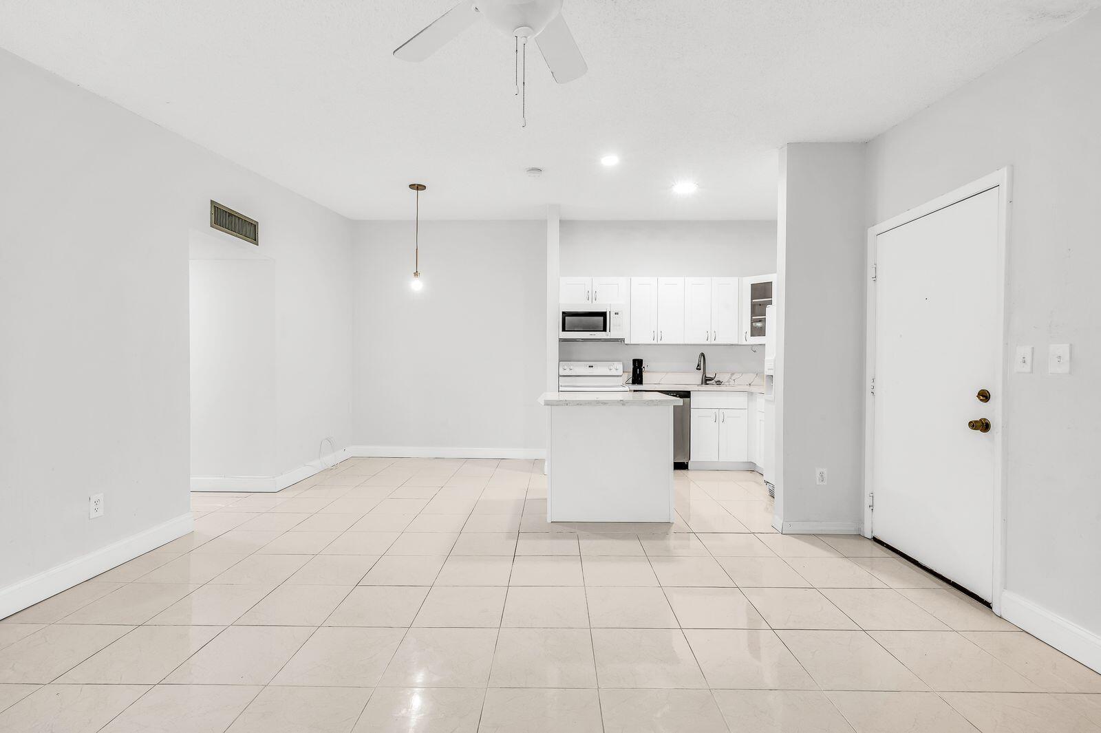 TAMARAC GARDENS CONDOMINI - Residential Lease